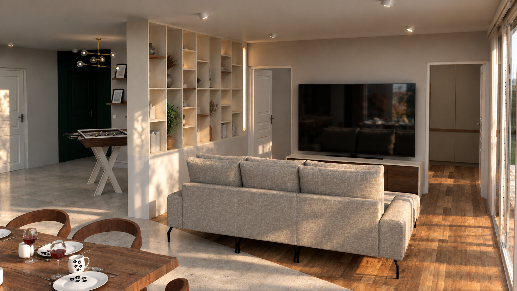 Salon contemporain avec meuble TV et bibliothèque sur mesure séparant les espaces